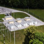 Aerial view shows battery energy storage systems arranged at a grid energy storage location