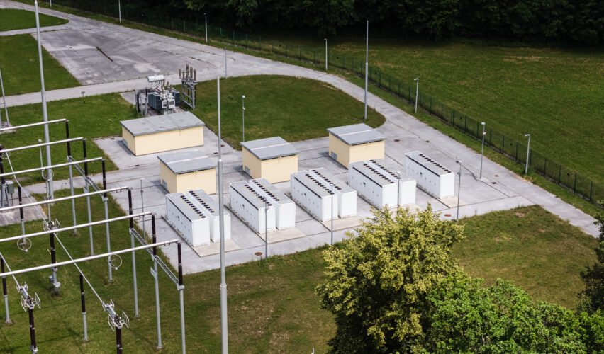 Aerial view shows battery energy storage systems arranged at a grid energy storage location